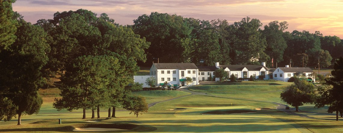 Holston Hills Country Club clubhouse above the golf course at sunset